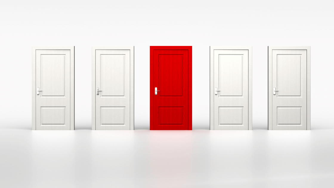 four white doors with one red door in the middle of them
