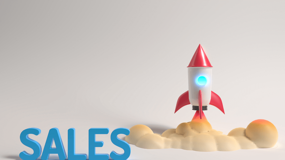 Blue text that says "sales" and a red rocket taking off.